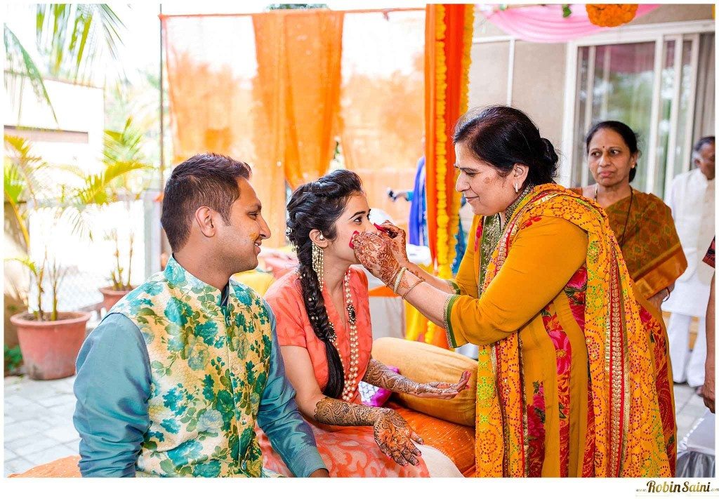 bride-groom-applying-haldi-13