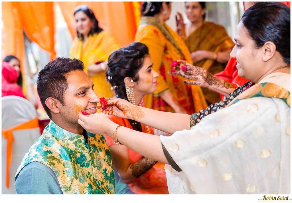 bride-groom-applying-haldi-15